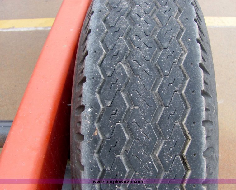 image for item 7035 Red Rhino 36' tandem axle round bale trailer