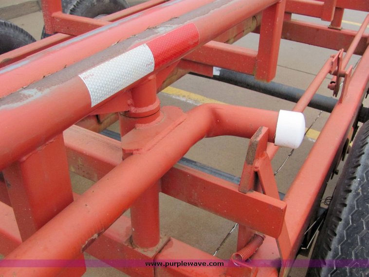 image for item 7035 Red Rhino 36' tandem axle round bale trailer