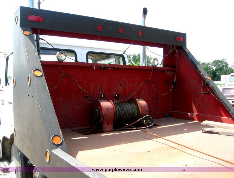 image for item 8884 1986 Volvo Mac F613 rollback with winch