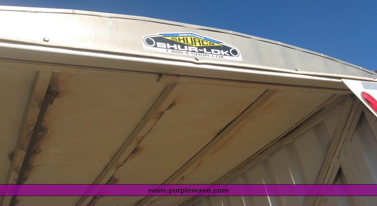 image for item 3813 2004 Shopbuilt grain hopper trailer with header cradle