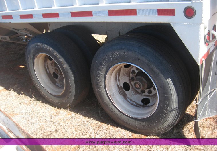 image for item 3813 2004 Shopbuilt grain hopper trailer with header cradle