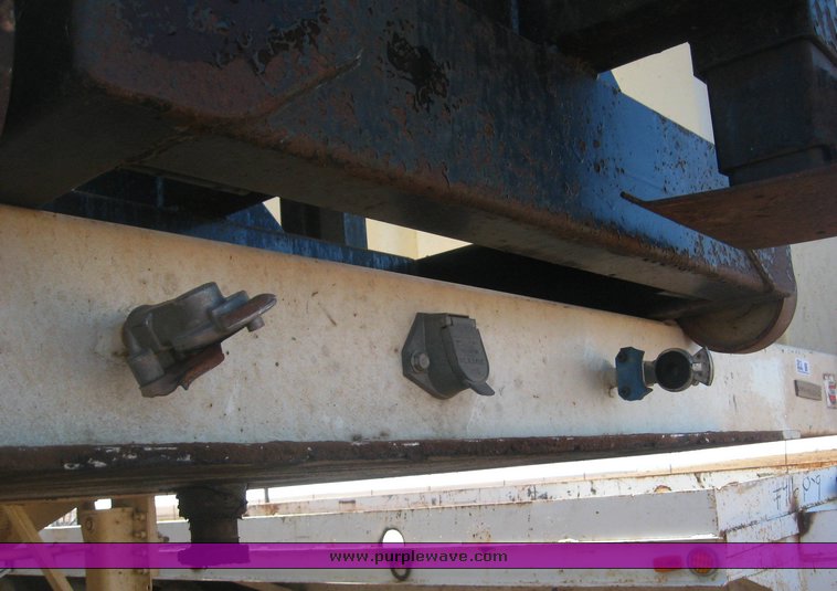 image for item 3813 2004 Shopbuilt grain hopper trailer with header cradle