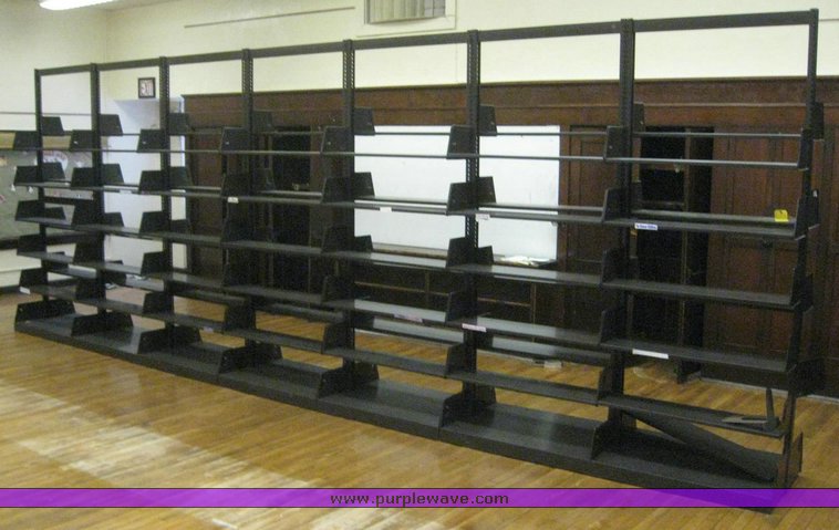 image for item 6871 Seven section double sided adjustable book shelf