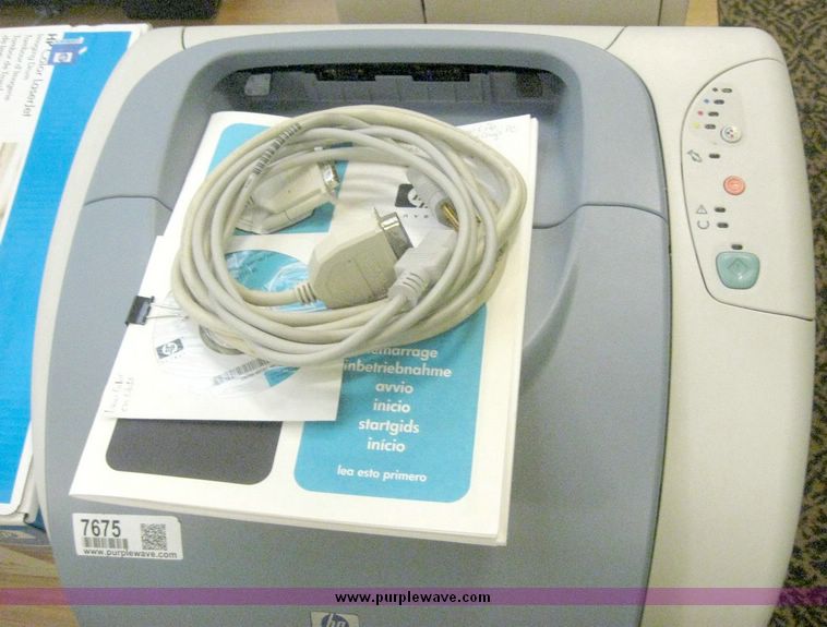 image for item 7675 HP 2500 Color LaserJet printer with image drum kit, manual and driver