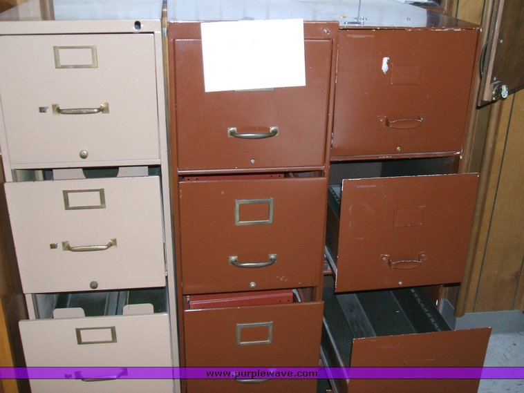 image for item 1012 Large assortment of furniture, office supplies, appliances, electronics, and household items