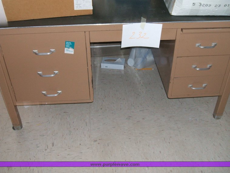 image for item 1012 Large assortment of furniture, office supplies, appliances, electronics, and household items