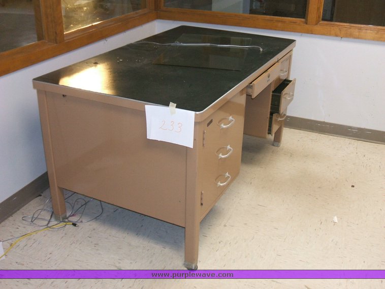 image for item 1012 Large assortment of furniture, office supplies, appliances, electronics, and household items