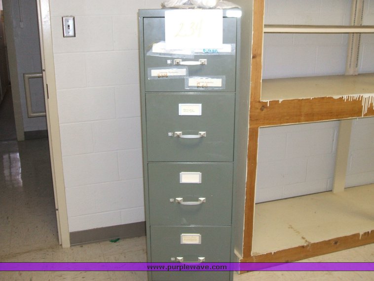 image for item 1012 Large assortment of furniture, office supplies, appliances, electronics, and household items