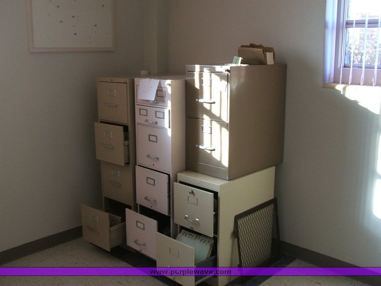 image for item 1012 Large assortment of furniture, office supplies, appliances, electronics, and household items