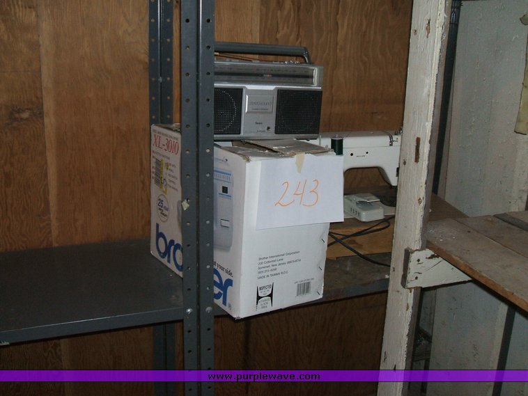 image for item 1012 Large assortment of furniture, office supplies, appliances, electronics, and household items