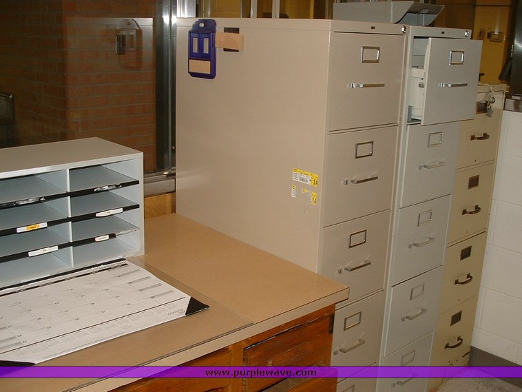 image for item 1012 Large assortment of furniture, office supplies, appliances, electronics, and household items
