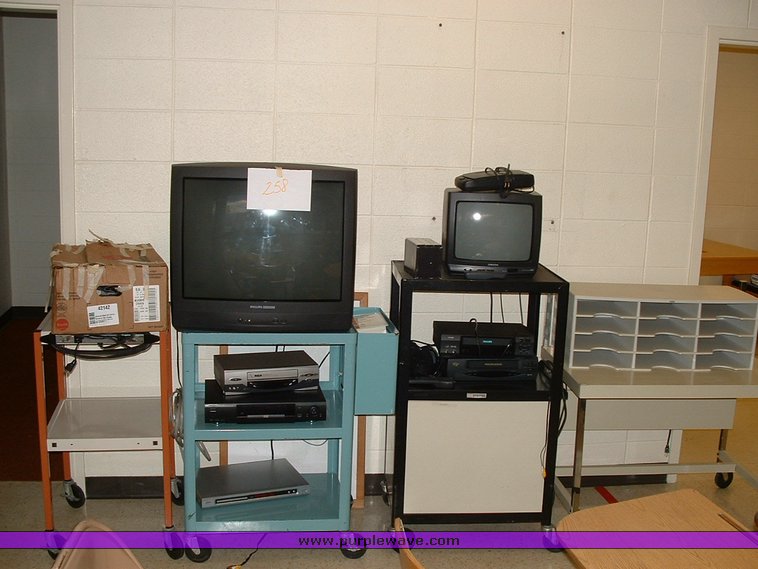 image for item 1012 Large assortment of furniture, office supplies, appliances, electronics, and household items