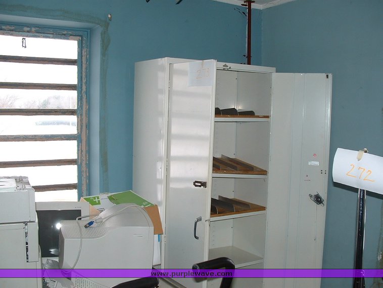 image for item 1012 Large assortment of furniture, office supplies, appliances, electronics, and household items