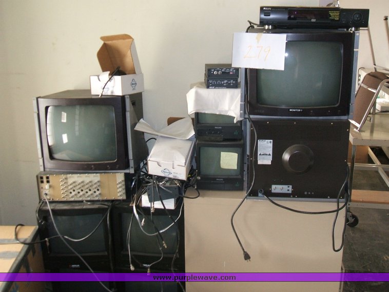 image for item 1012 Large assortment of furniture, office supplies, appliances, electronics, and household items