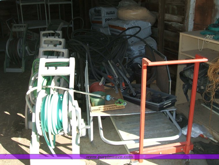 image for item 1012 Large assortment of furniture, office supplies, appliances, electronics, and household items