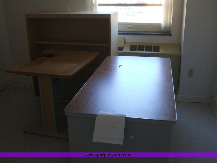 image for item 1012 Large assortment of furniture, office supplies, appliances, electronics, and household items