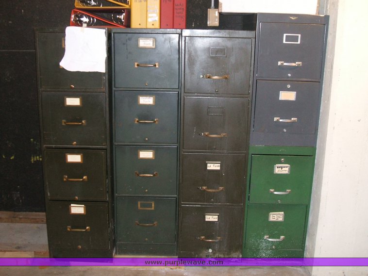 image for item 1012 Large assortment of furniture, office supplies, appliances, electronics, and household items