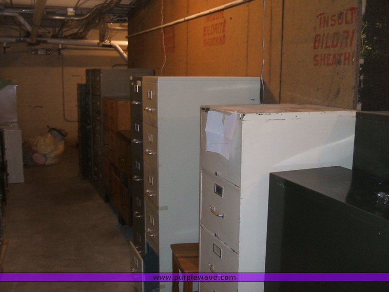 image for item 1012 Large assortment of furniture, office supplies, appliances, electronics, and household items