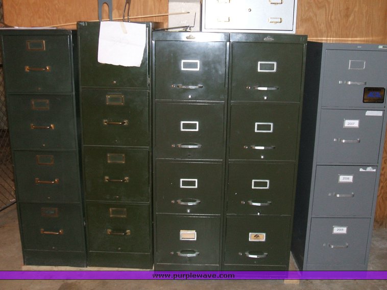 image for item 1012 Large assortment of furniture, office supplies, appliances, electronics, and household items