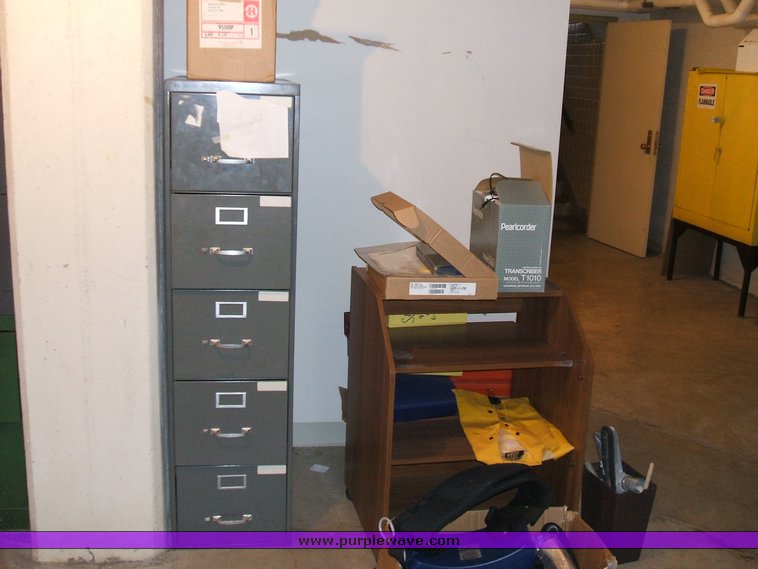 image for item 1012 Large assortment of furniture, office supplies, appliances, electronics, and household items