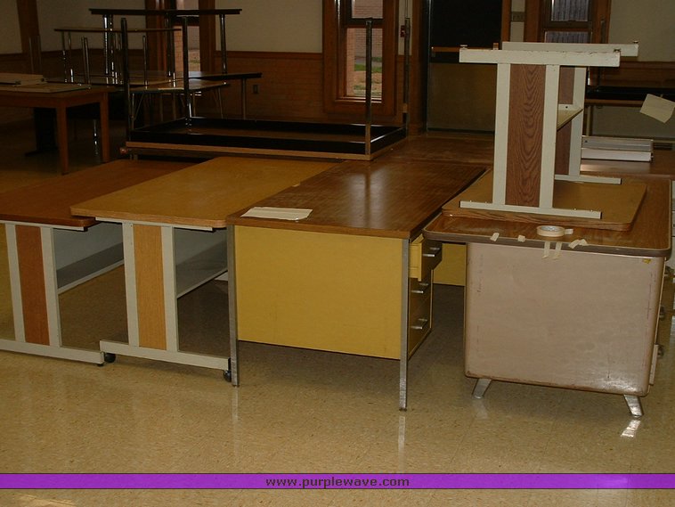 image for item 1012 Large assortment of furniture, office supplies, appliances, electronics, and household items