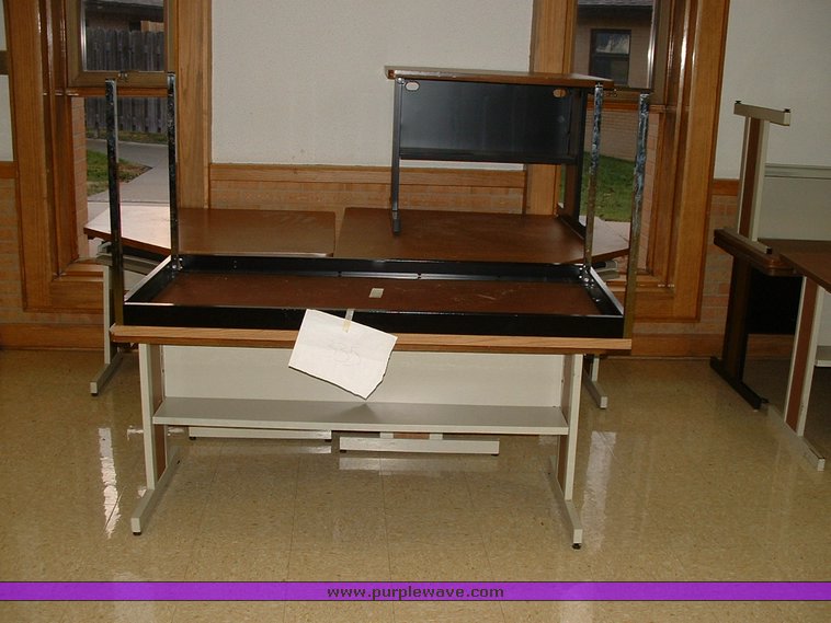 image for item 1012 Large assortment of furniture, office supplies, appliances, electronics, and household items