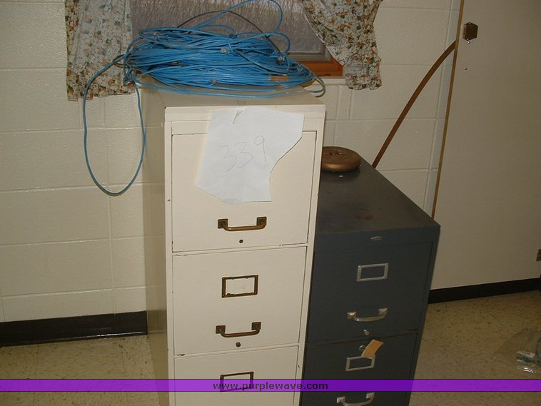 image for item 1012 Large assortment of furniture, office supplies, appliances, electronics, and household items