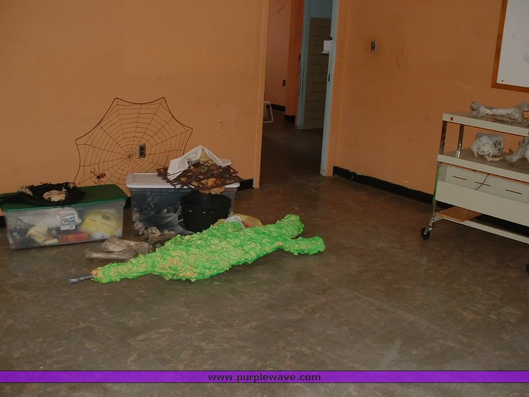 image for item 1012 Large assortment of furniture, office supplies, appliances, electronics, and household items