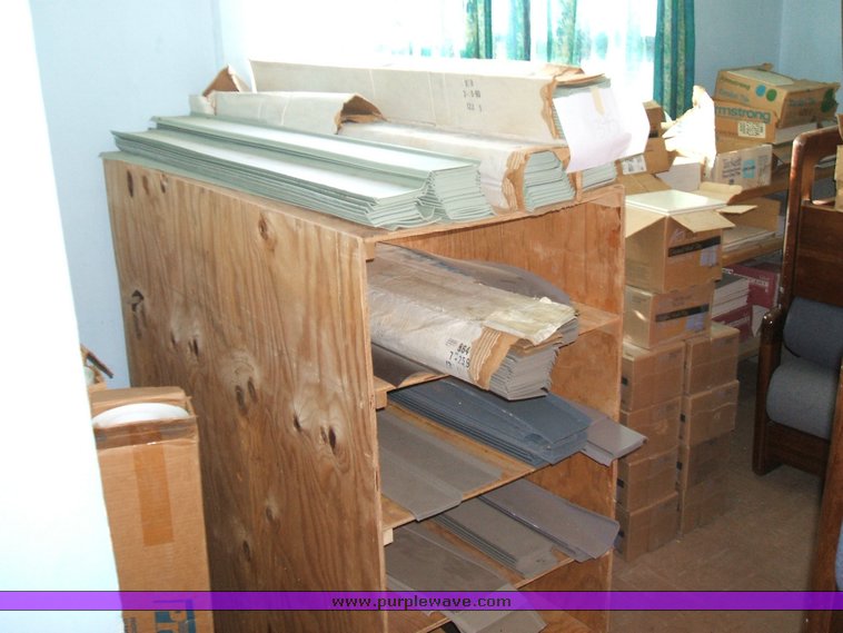 image for item 1012 Large assortment of furniture, office supplies, appliances, electronics, and household items