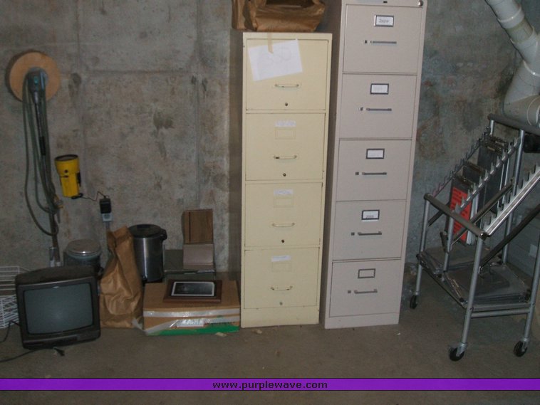 image for item 1012 Large assortment of furniture, office supplies, appliances, electronics, and household items