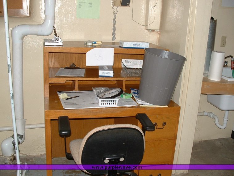 image for item 1012 Large assortment of furniture, office supplies, appliances, electronics, and household items