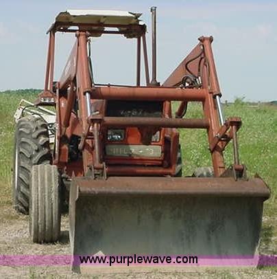 image for item 3331 1988 Hesston 5566 tractor with L355 loader