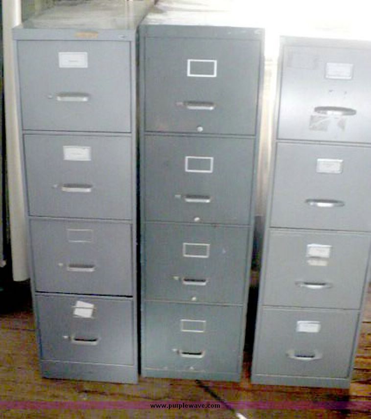 image for item 5099 (3) four drawer filing cabinets