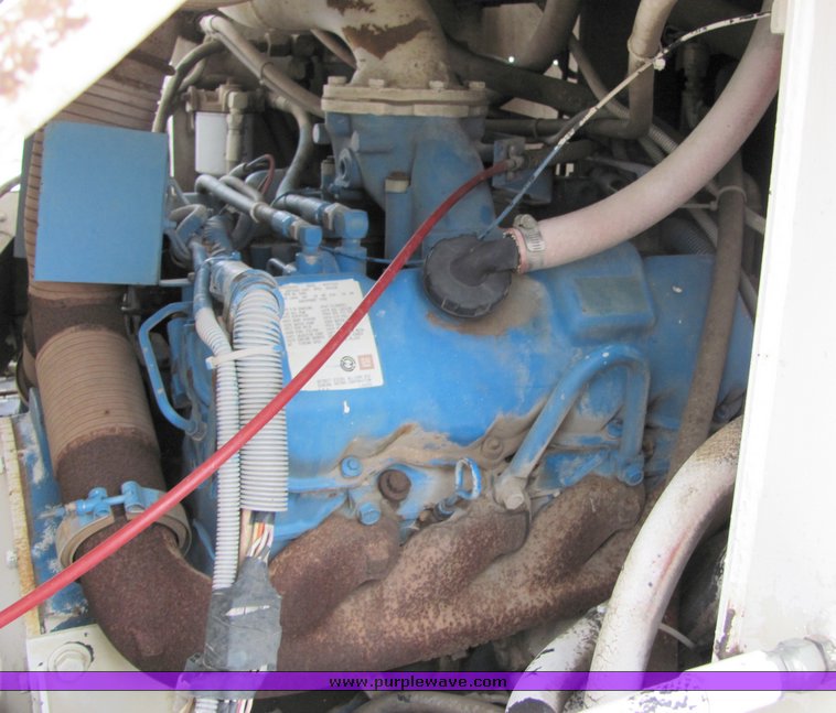 image for item 8034 1986 FMC Vanguard 3000 street sweeper