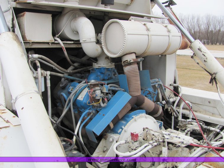 image for item 8034 1986 FMC Vanguard 3000 street sweeper