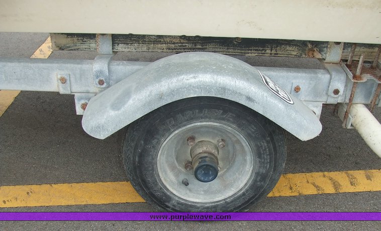 image for item 6626 1993 Carolina V bottom fiberglass boat with trailer