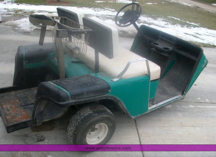 image for item 9001 EZ Go three wheel golf cart