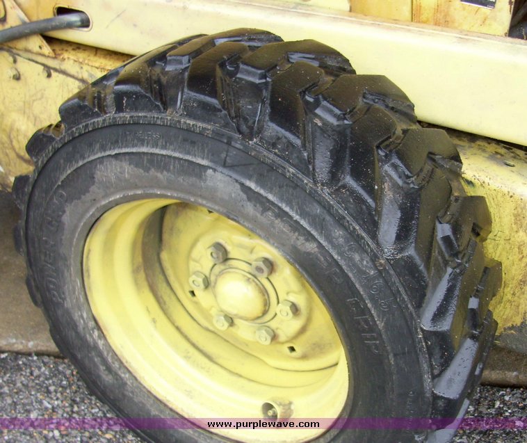 image for item 5081 New Holland L775 skid steer