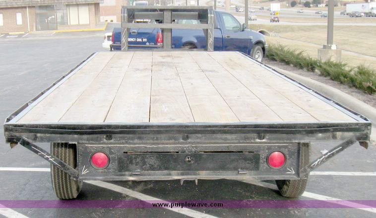 image for item 5332 1983 WW flatbed gooseneck trailer