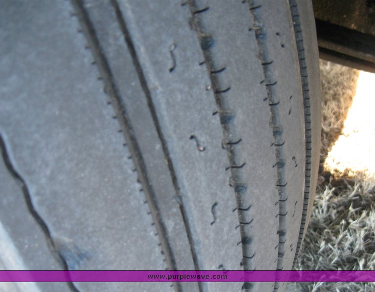 image for item 8073 2000 Volvo Conventional Cab tandem axle semi truck with sleeper