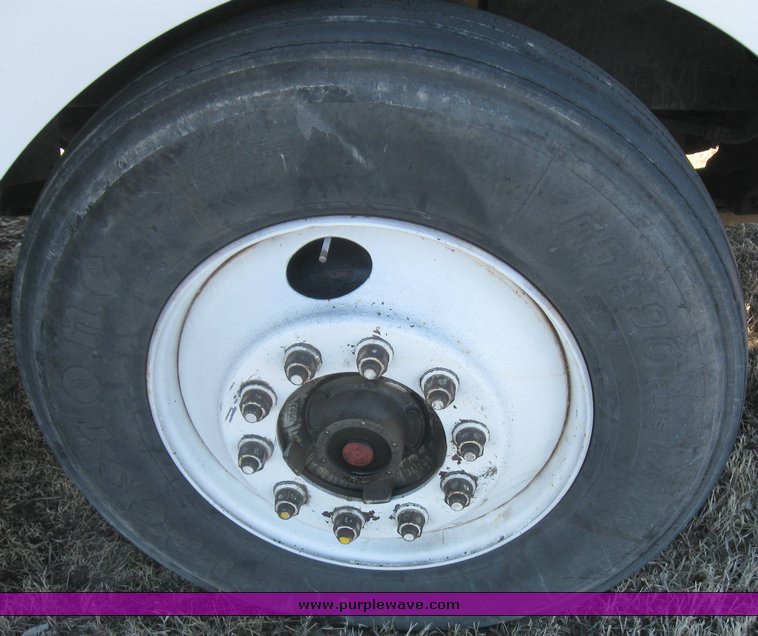 image for item 8073 2000 Volvo Conventional Cab tandem axle semi truck with sleeper