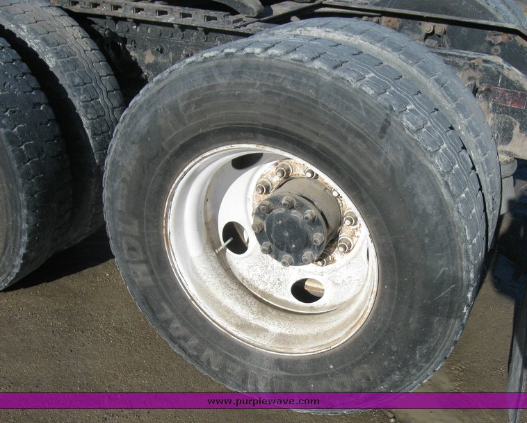 image for item 8073 2000 Volvo Conventional Cab tandem axle semi truck with sleeper