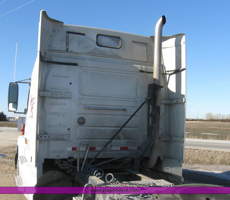 image for item 8073 2000 Volvo Conventional Cab tandem axle semi truck with sleeper