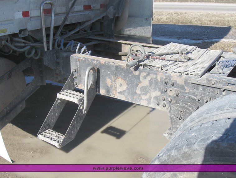 image for item 8073 2000 Volvo Conventional Cab tandem axle semi truck with sleeper