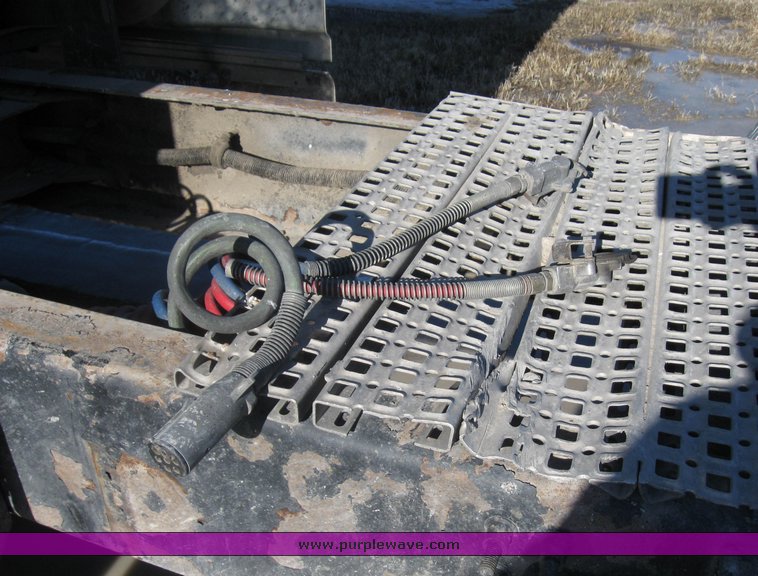 image for item 8073 2000 Volvo Conventional Cab tandem axle semi truck with sleeper