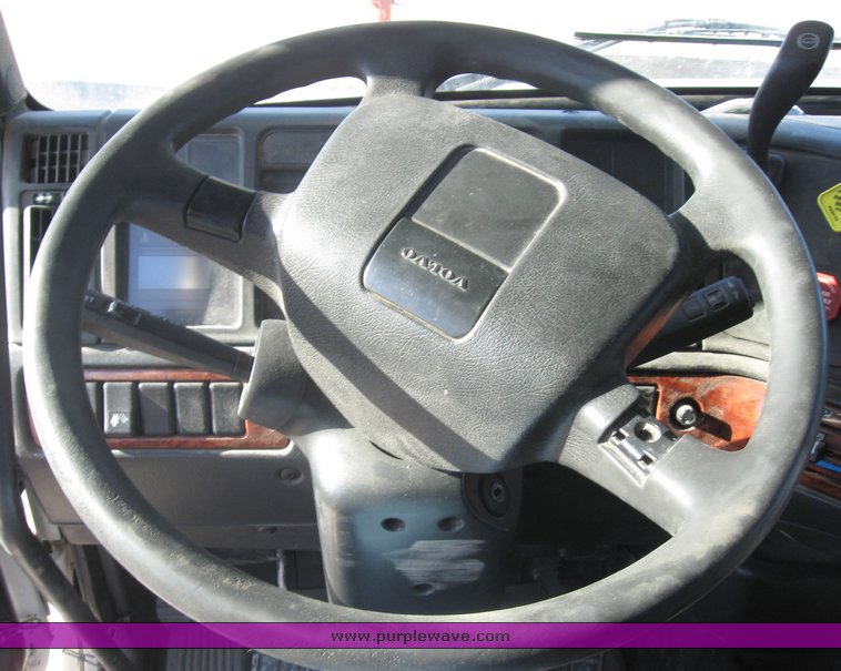 image for item 8073 2000 Volvo Conventional Cab tandem axle semi truck with sleeper