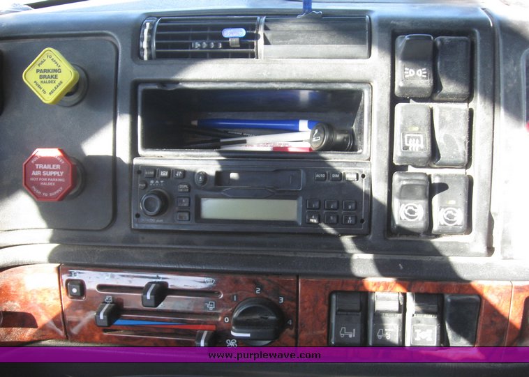 image for item 8073 2000 Volvo Conventional Cab tandem axle semi truck with sleeper