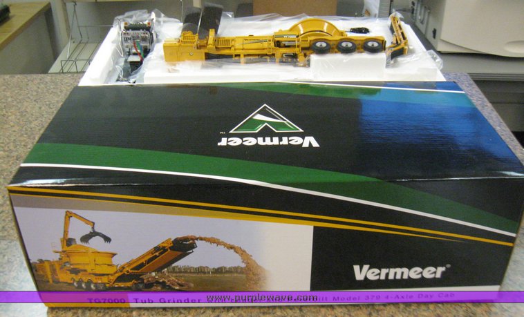 image for item 3032 Scale model of a Vermeer TG7000 tub grinder with loader and Peterbilt 379 four axle day cab semi truck