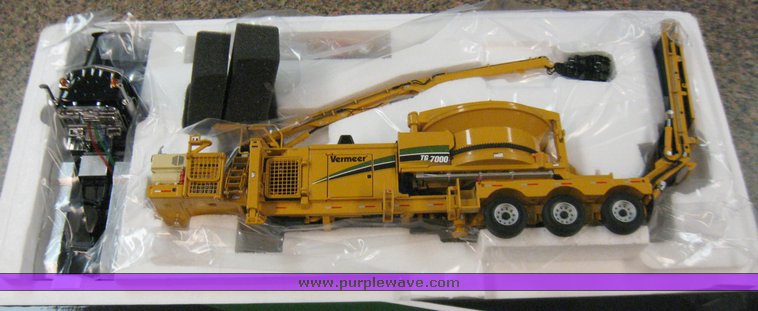image for item 3032 Scale model of a Vermeer TG7000 tub grinder with loader and Peterbilt 379 four axle day cab semi truck