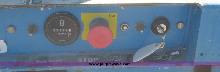 image for item 3871 2003 Genie GS-3246 scissor lift